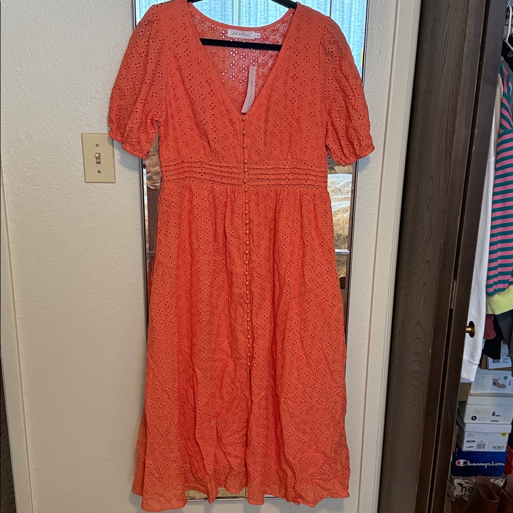 One loved Babe Chic Orange Eyelet Midi Dress
